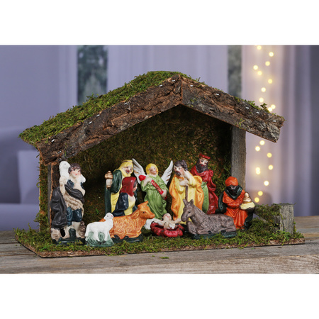 Nativity scene including statues and background
