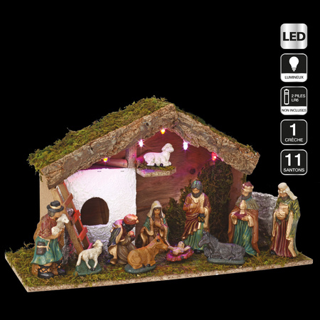 Wood nativity scene including statues and light including background