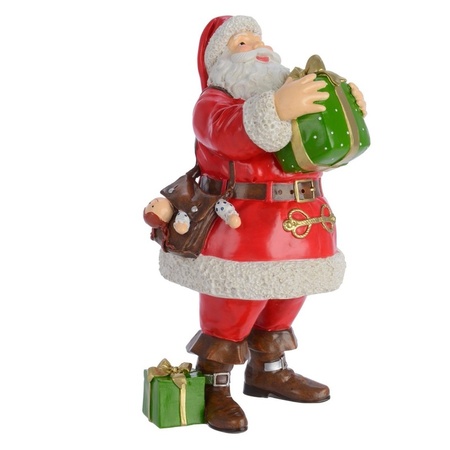 Santa Claus statue with present 23 cm
